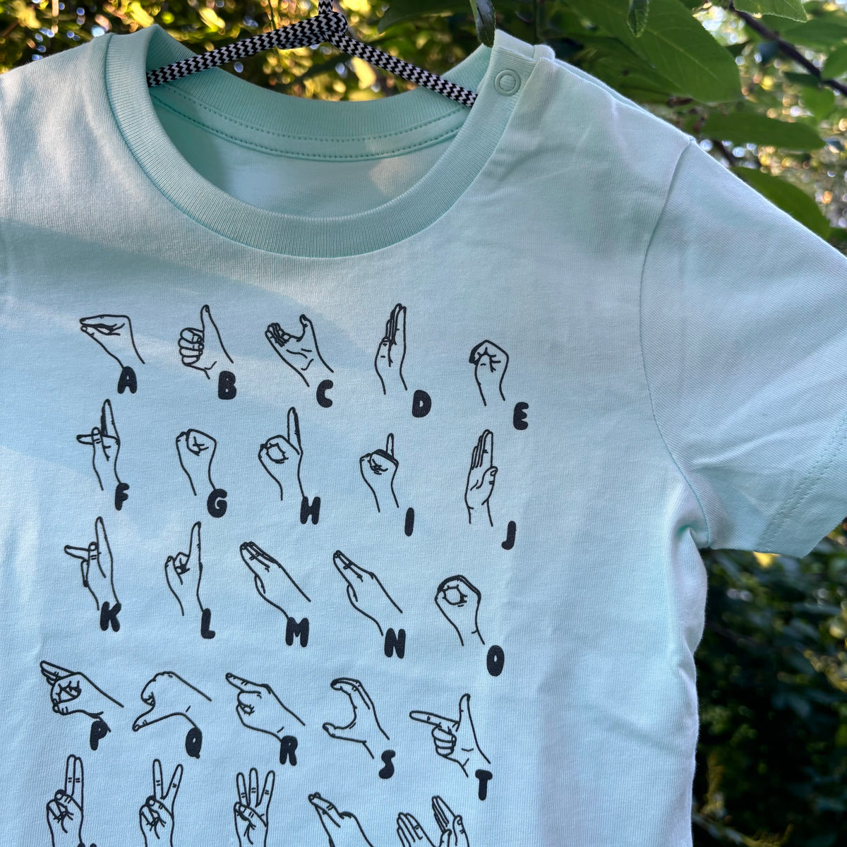 T-shirt BABY - Karibisk blå/Svart